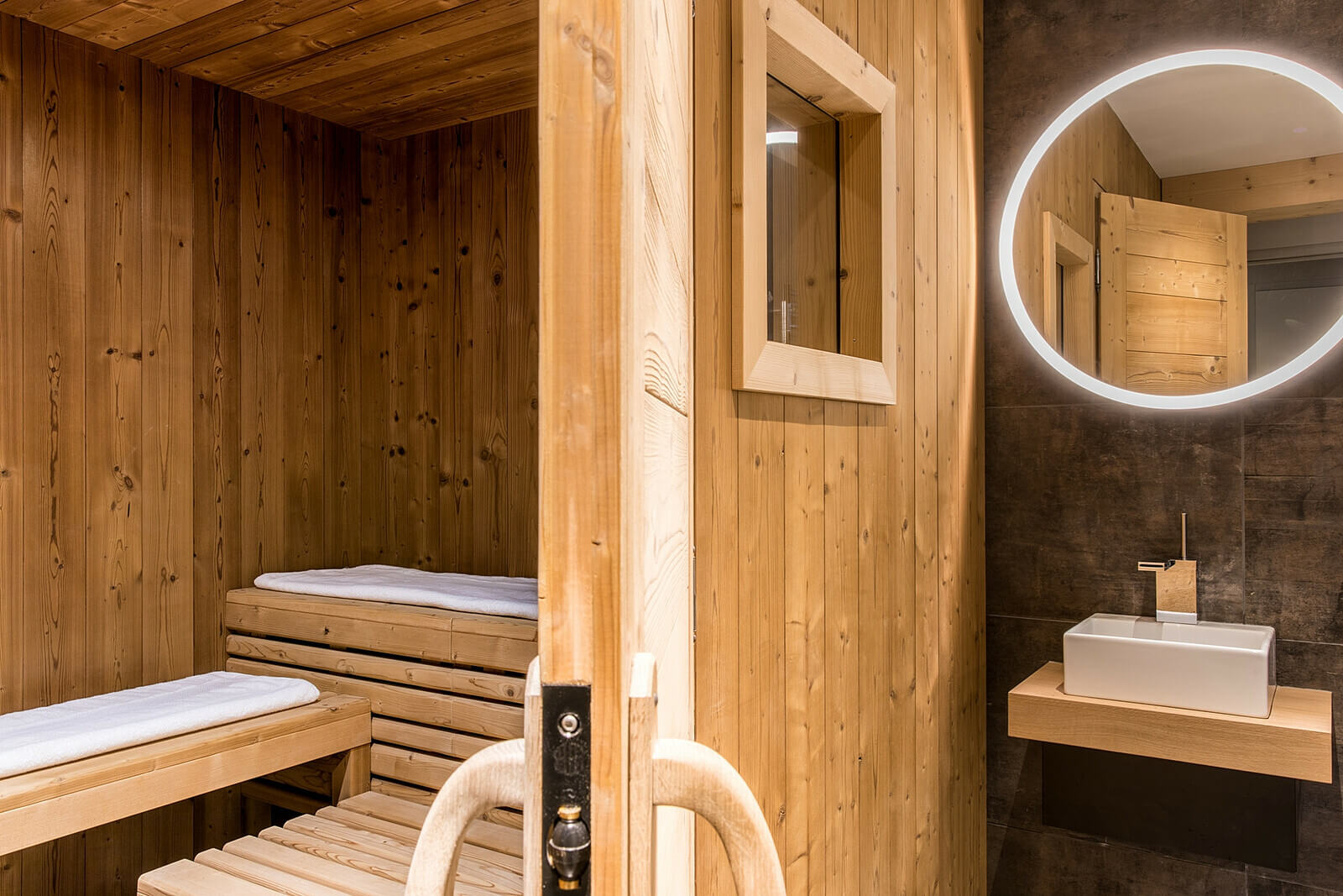 Large sauna and rain shower to soothe your muscles